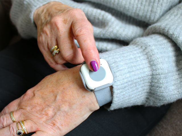 Lady wearing her Smart Trigger on her wrist